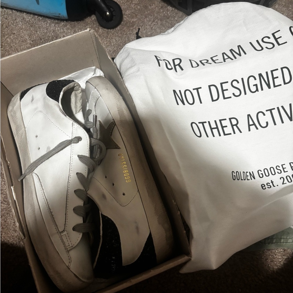 Golden Goose White Sneakers with Black and Gold Accents